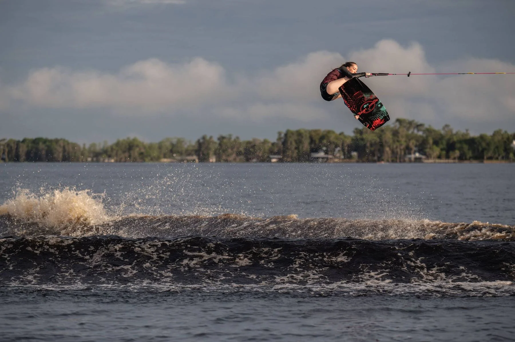 Kira Lewis grabbing high above the lake