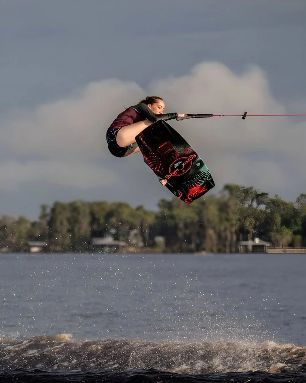 Kira Lewis grabbing high above the lake
